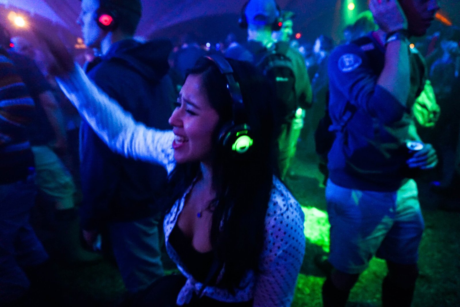 A woman dancing at a silent disco at Glastonbury Festival in 2016